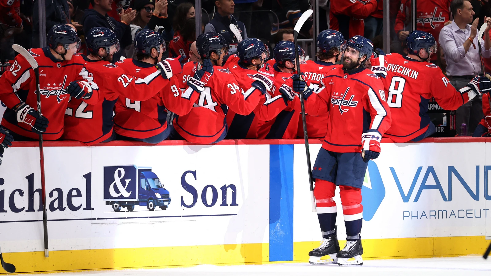 File photo: Washington Capitals forward Alex Tuch celebrates with teammates at the bench after scoring against the Pittsburgh Penguins at Capital One Arena on Oct. 7, 2026.