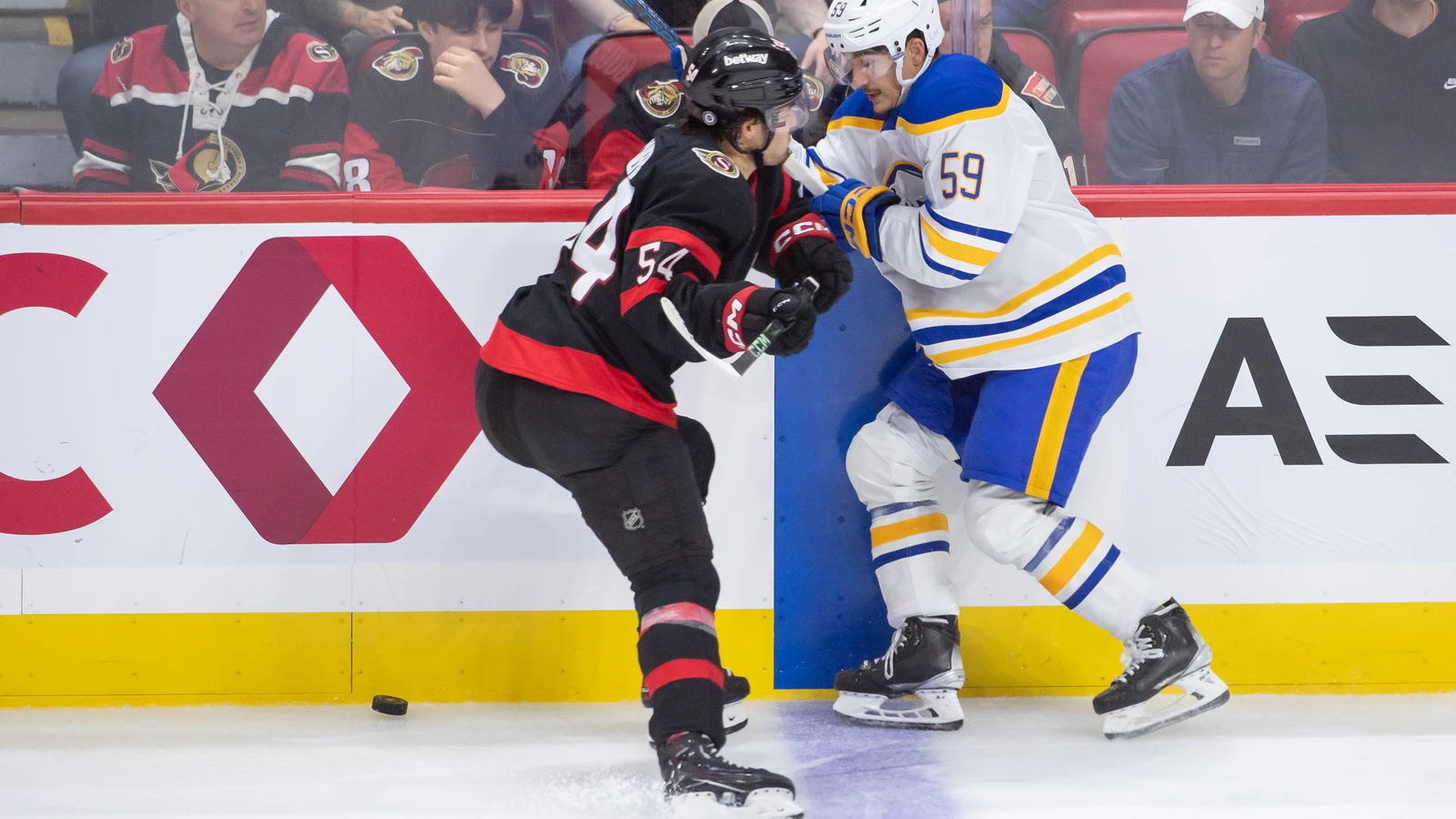 Buffalo Sabres forward Ty Tullio, number 59, battles Ottawa Senators forward Tyler Boucher for the puck during an NHL preseason game in Ottawa on September 26, 2024. File photo.