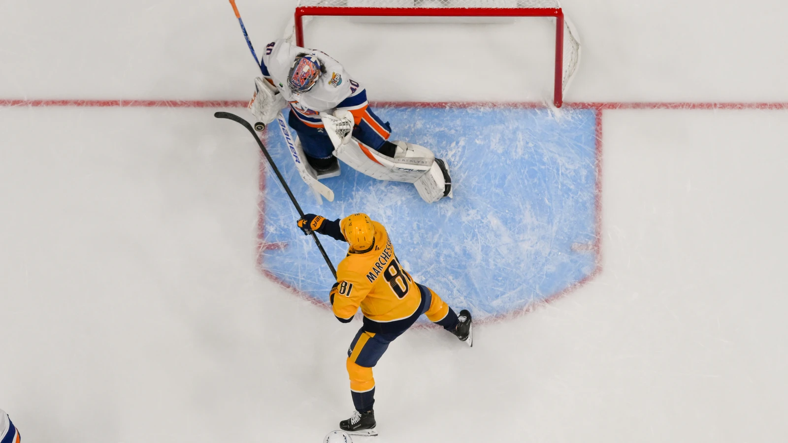 Semyon Varlamov makes a save for the New York Islanders against the Nashville Predators at Bridgestone Arena.