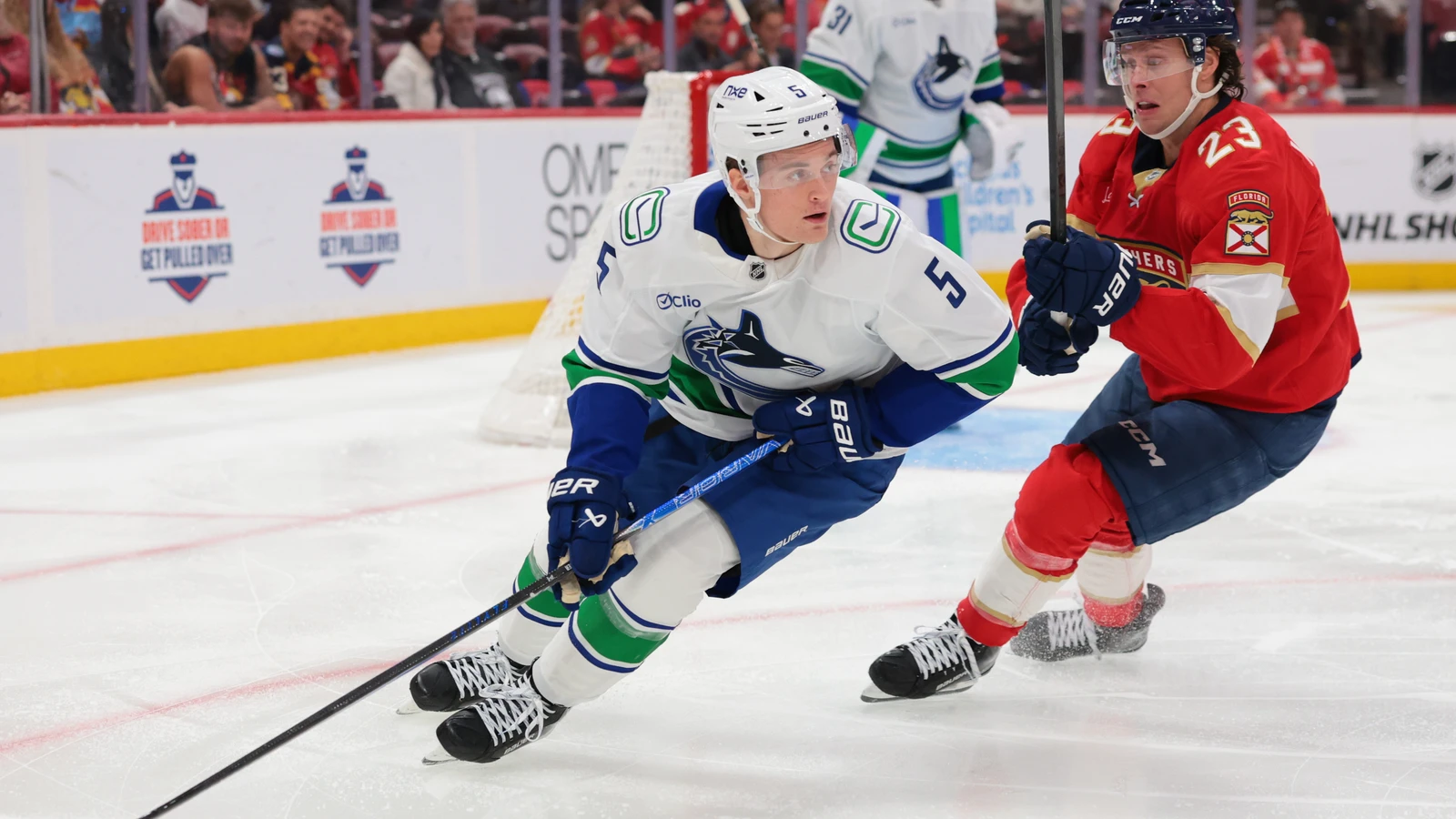File photo: Florida Panthers forward Carter Verhaeghe pursues Vancouver Canucks defenceman Tom Willander at Amerant Bank Arena.
