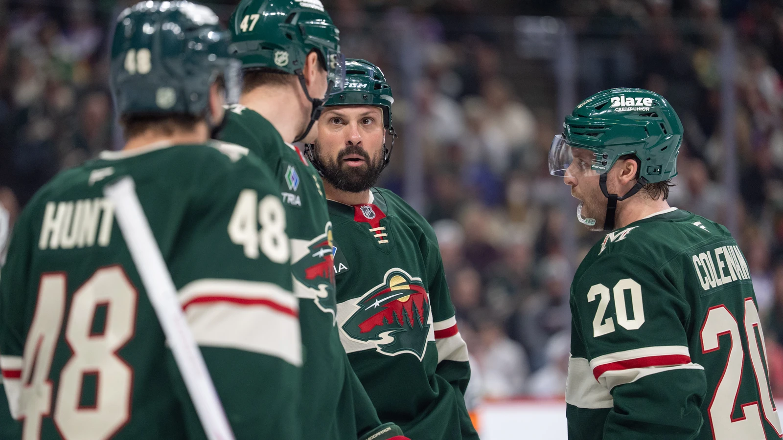 File photo: Minnesota Wild players gather on the ice at Grand Casino Arena.