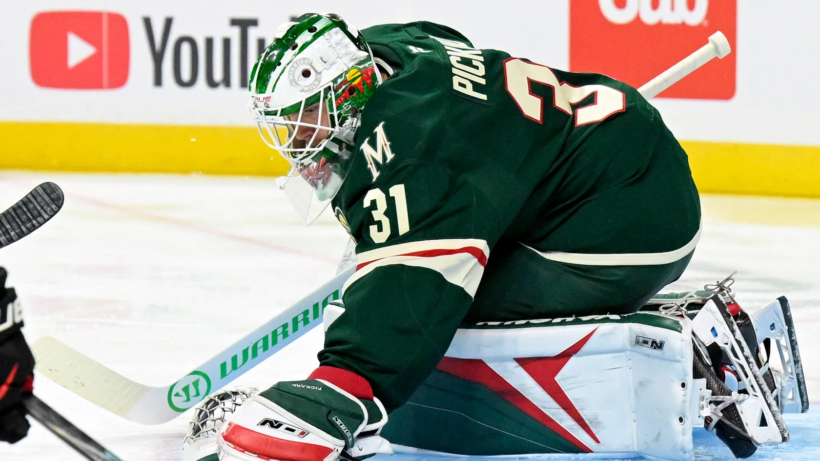 File photo: Minnesota Wild goaltender Calvin Pickard covers the puck against the Chicago Blackhawks in Saint Paul.