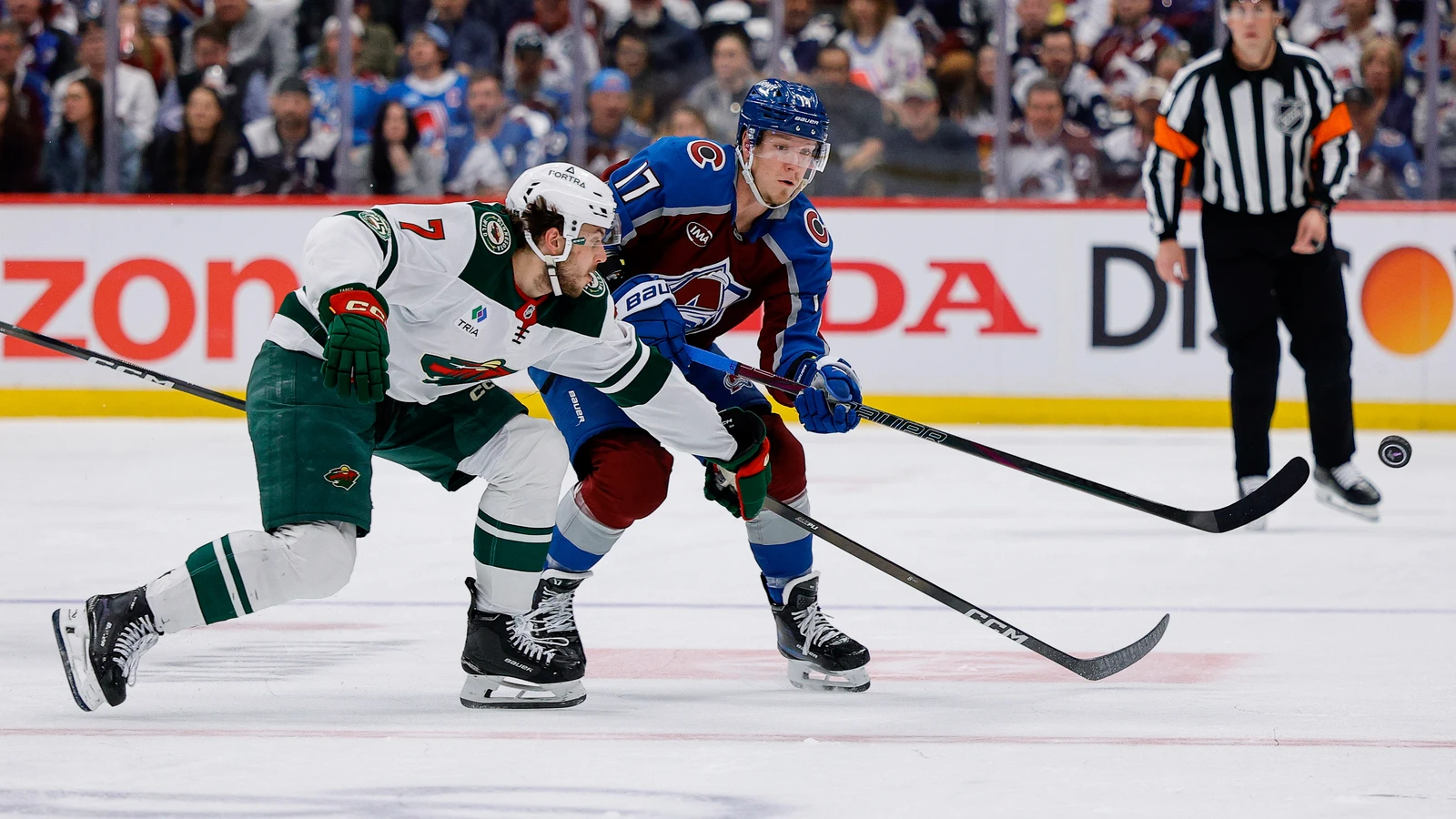 File photo: Minnesota Wild defenceman Brock Faber (7) pursues Colorado Avalanche forward Parker Kelly during a May 13, 2026 playoff game in Denver.