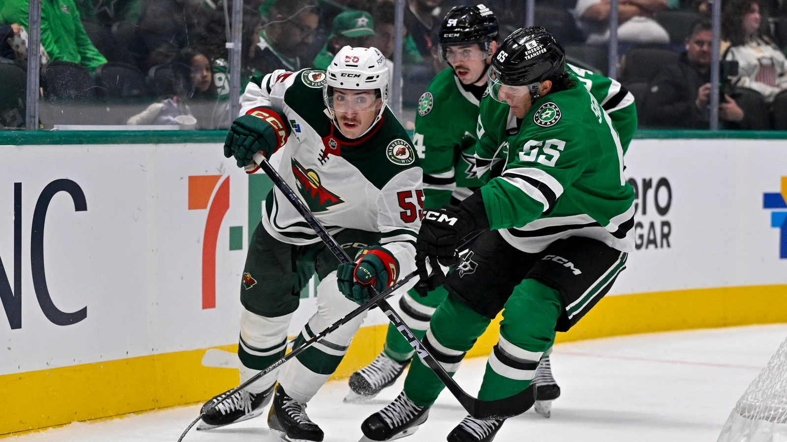 File photo: Minnesota Wild defenceman Carson Lambos chases the puck beside Dallas Stars forward Michael Sgarbossa in Dallas.