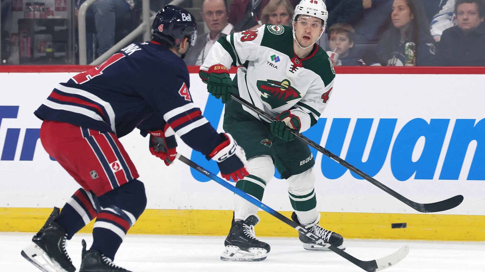 File photo: Wild right wing Maxim Shabanov shoots the puck against the Jets at Canada Life Centre in Winnipeg.